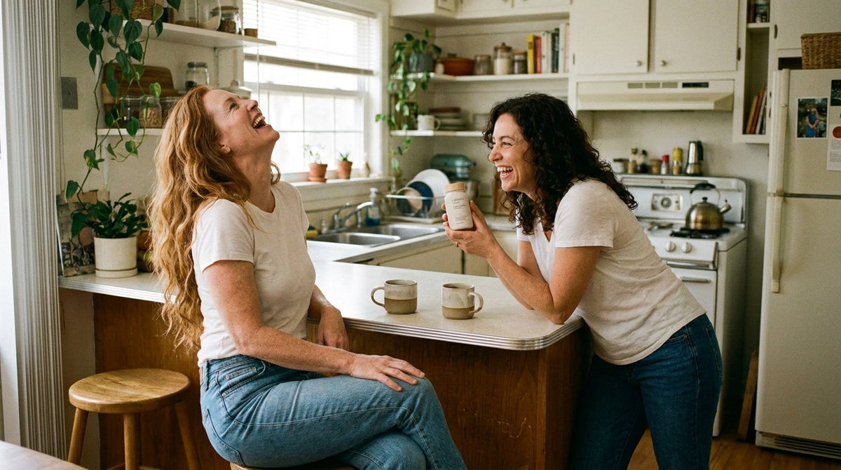 Two women laughing together